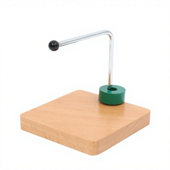 Disks uz horizontāla, taisna metāla stieņa